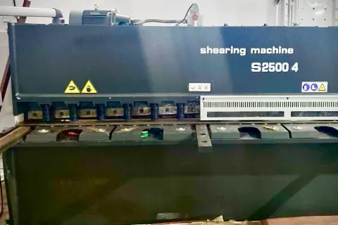 Metal sheet shearing machine at Hospitime facility
